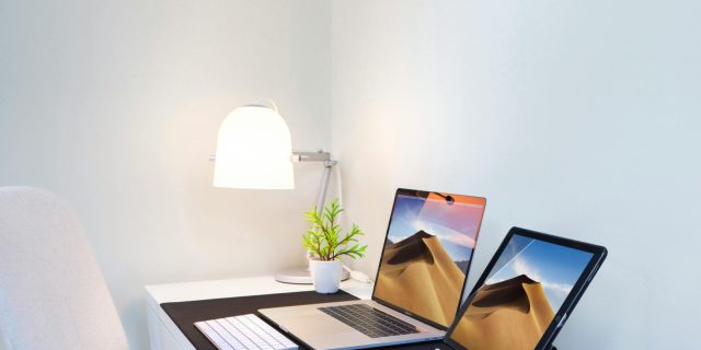 Photo of a Laptop and a Tablet on the Table